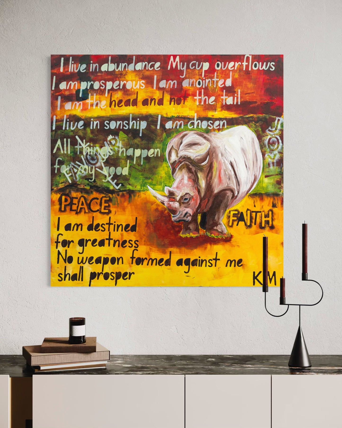The Power of Words - Prophetic Declaration canvas displayed in modern living room - Christian inspirational wall art by Art By Kudzi. Decorative wall art with a rhinoceros and motivational  sciputre based text on a colorful background, displayed on a wall.